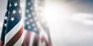 american flags waving in sunlight